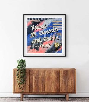 Raised On Sunsets & Saddle Dust | 100 x 100cm | Framed in black
